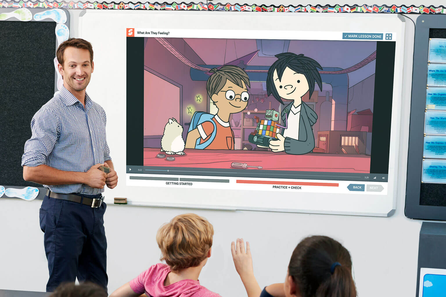 Teacher in class with projector screen