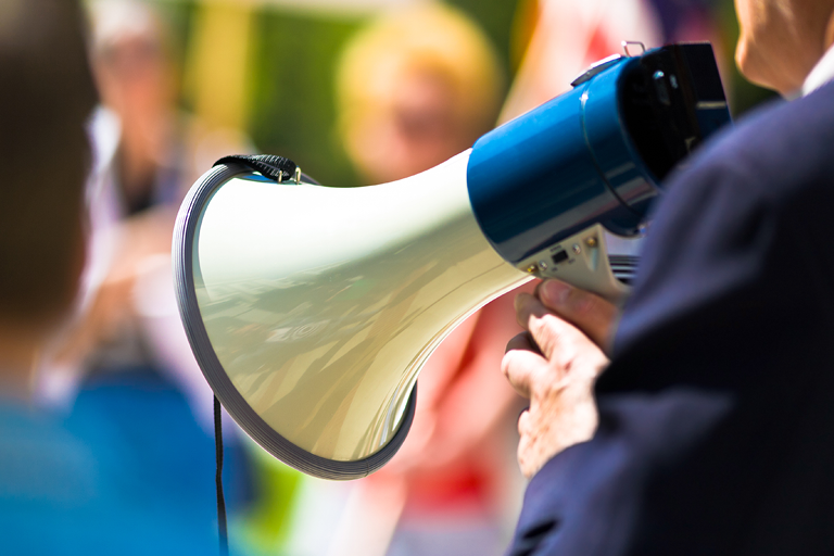 A speaker with a megaphone.