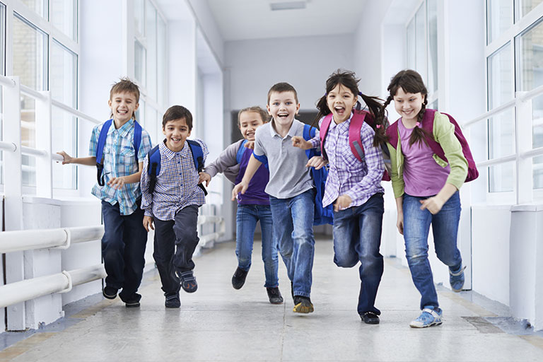 kids running through hall