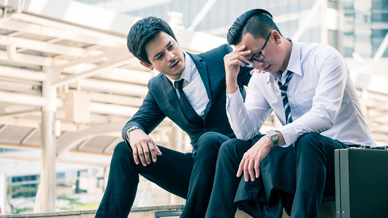 one worker comforting another; workplace readiness skills